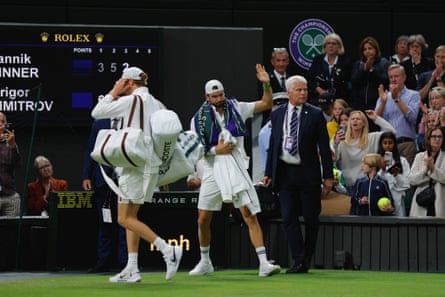 Grigor Dimitrov acknowledges the Centre Court crowd at the conclusion of his match with Jannik Sinner.