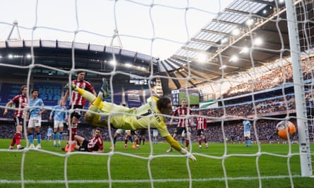 Max Alleyne scores Manchester City’s opening goal, seen through the net
