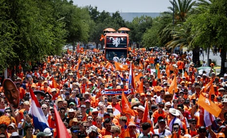 Dutch fans with their orange bus fill the streets of Monterrey.