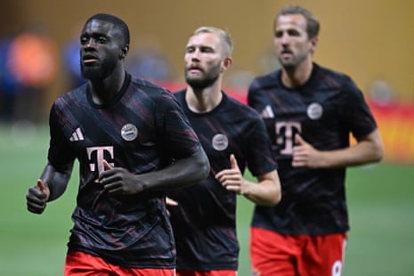 Dayot Upamecano (left), Konrad Laimer (centre) and Harry Kane warm up ahead of kick-off.