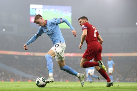 Cole Palmer skips past the tackle of old James Milner.