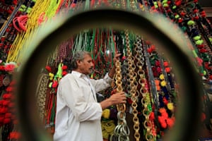 Peshawar, Pakistan. Ornaments for sacrificial animals on sale, on a road side ahead of the Muslim festival of Eid al-Adha