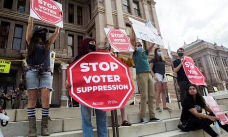 Voting rights activists gather during a protest against Texas legislators who are advancing a slew of new voting restrictions in Austin, Texas, on 8 May 2021.