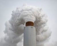 emissions rise from a smokestack