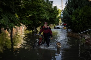 About 42,000 people are at risk from flooding on both sides of the Dnipro River, Ukrainian officials have said