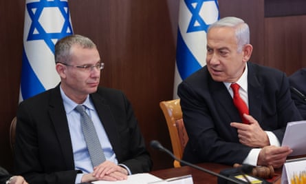 Benjamin Netanyahu (right) with Yariv Levin at a cabinet meeting in Jerusalem, 5 March 2023.