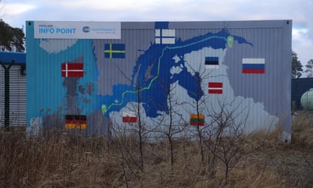 A map shows the course of Nord Stream 2 on the exterior of a building close to the receiving station for the pipeline near Lubmin, Germany