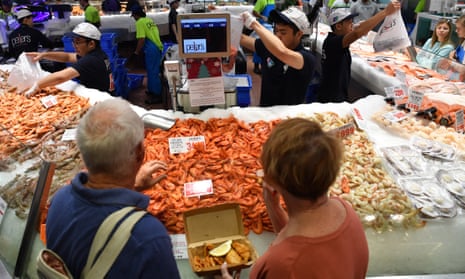 People buying seafood at Sydney Fish Market