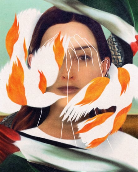 A woman with brown hair and a neutral expression is shown in a soft-focus portrait. Overlaid on her face are white, hand-drawn outlines of two hands partially covering her eyes. Doves in flames surround her face. In the background, a green, white, and red flag is draped.