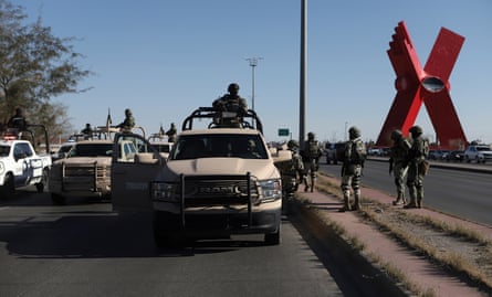 Military authorities investigate an area near the entrance of a clandestine tunnel in Juarez, Mexico, on 14 January.