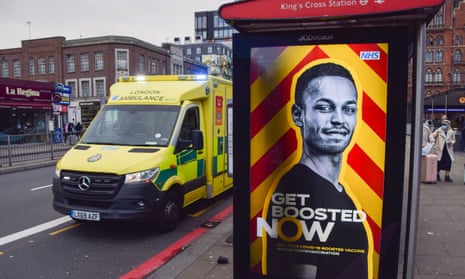 Booster advert in King's Cross, London, 2 January 2022.