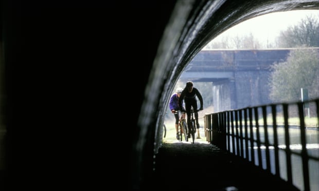 Cyclists on a canal towpath in Birmingham
