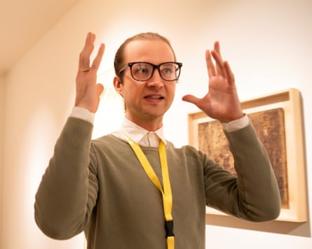 Joseph Langelinck with his hands raised to head height