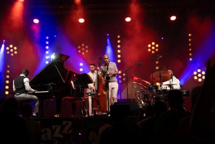Four-piece jazz band playing on stage