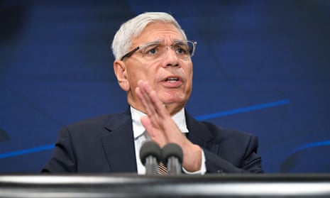 Warren Mundine speaking behind a lectern