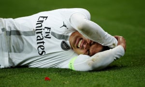 Thiago Silva, PSG, reacts after suffering a