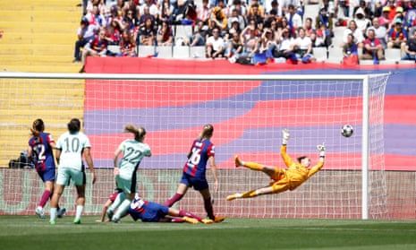 Chelsea's Erin Cuthbert (centre) fires a shot past Barcelona's keeper Cata Coll to open the scoring.