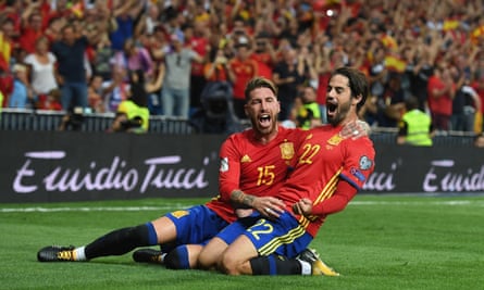 Isco celebrates with Sergio Ramos after scoring Spain’s opening goal in the 3-0 win against Italy in September