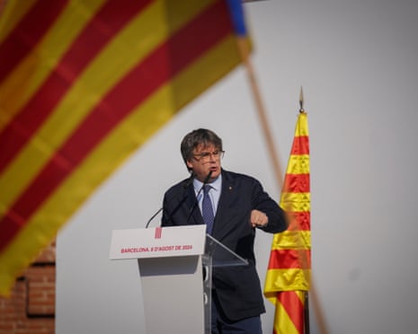 Carles Puigdemont addresses supporters after his arrival near the Catalan parliament in 2024.