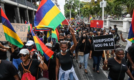 Protesters march on Saturday against the government’s response to the oil spill disaster in Port Louis, Mauritius.