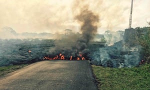The lava flow crosses Apa’a Street and Cemetery Road near Pahoa