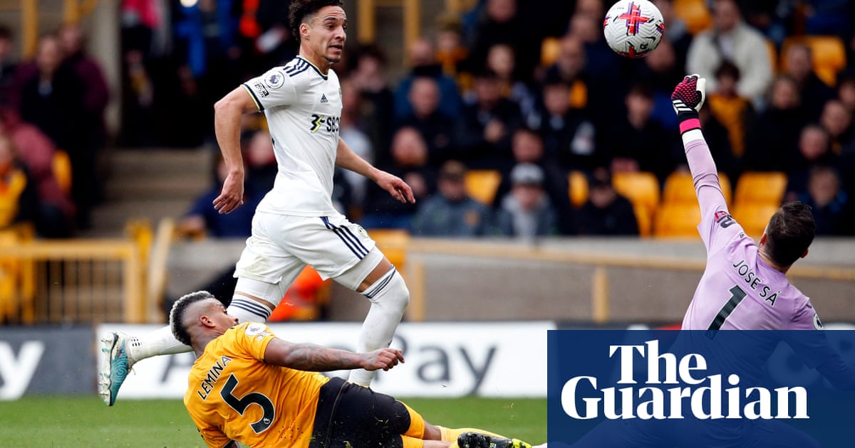 Rodrigo seals vital victory for Leeds over 10-man Wolves in furious thriller