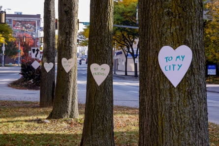 Messages of hope pinned on trees in Lewiston, Maine on Friday.