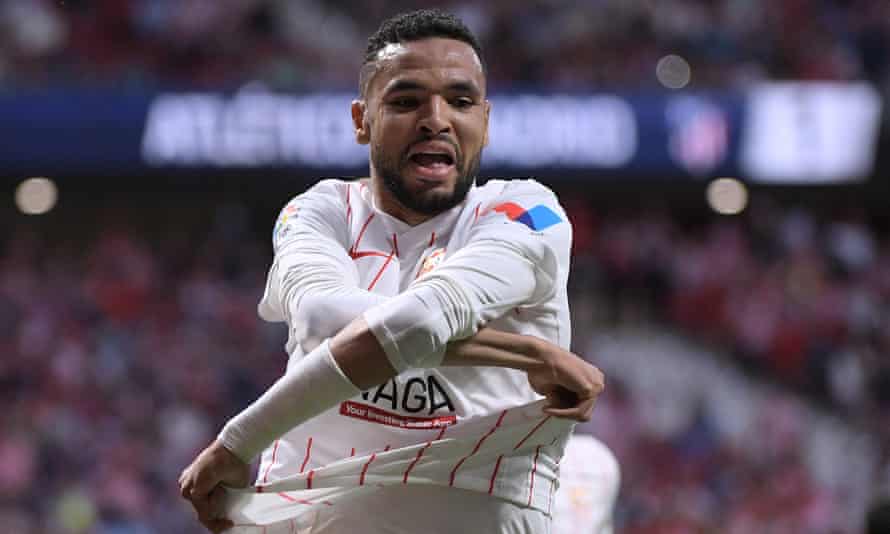 European roundup: Victories for Milan and Inter send Serie A race to final day | European club football 1 Sevilla’s Youssef En-Nesyri celebrates his goal against Atlético Madrid.