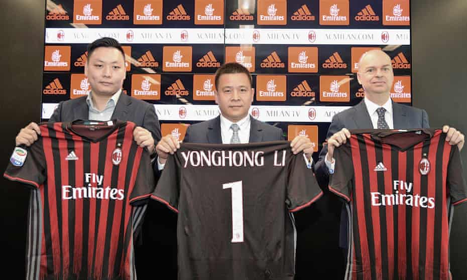New Milan board member Li David Han, left, owner and president Li Yonghong, centre, and CEO Marco Fassone during a press conference on 14 April 2017.