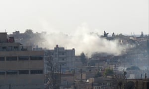 Smoke rises in Qamishli following shelling by Turkish forces on Thursday.