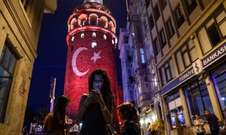 A woman on her phone in Istanbul, several weeks after the failed military coup. Security experts say the messaging app left information about its users unencrypted.