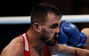 Aliaksandr Radzionau of Belarus in action against Necat Ekinci of Turkey