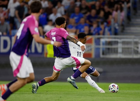 Omari Hutchinson fires a left foot shot into the German goal to double England’s lead.