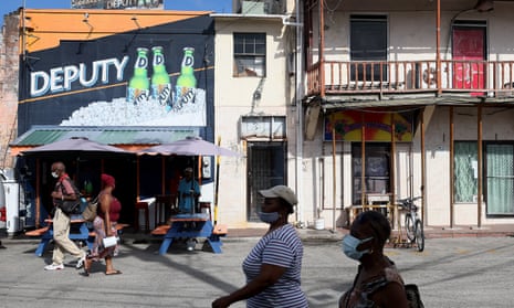 Pedestrians make they way through the streets of downtown Bridgetown in Barbados last week.