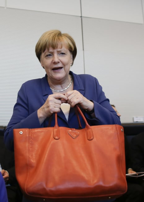 German Chancellor Angela Merkel arrives for a special meeting of the Christian Democratic Union (CDU) party faction on the eve of a special session of the parliament Bundestag about negotiations with Greece for a new bailout in Berlin, Germany, Thursday, July 16, 2015..(AP Photo/Markus Schreiber)