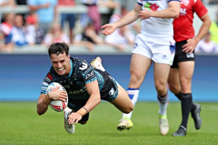 David Armstrong dives in to score a try for Leigh
