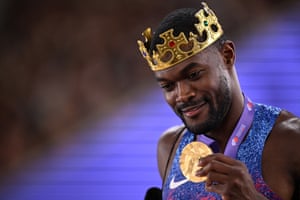 Rai Benjamin of the United States wears a crown as he celebrates with the men’s 400m hurdles gold medal