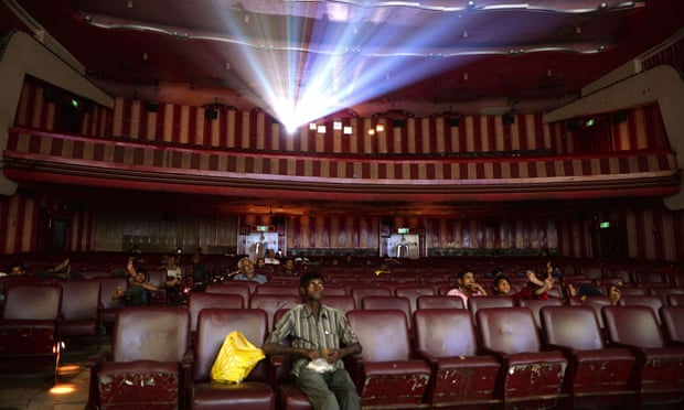 Indian cinemagoers watch a screening of a Bollywood film.