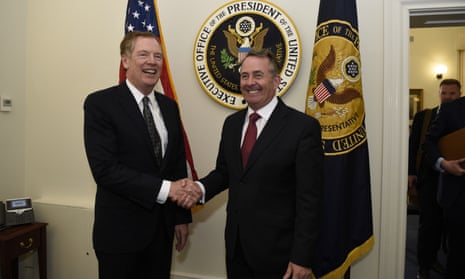 Liam Fox (right) and the US trade representative Robert Lighthizer shake hands before the first trade working group in Washington on Monday. 