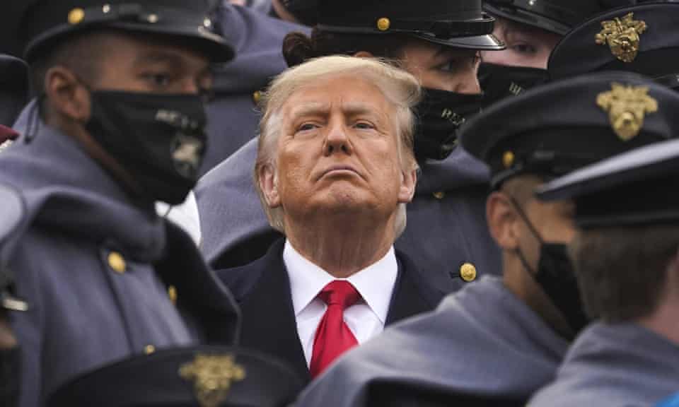Surrounded by Army cadets, Donald Trump watches the first half of the 121st Army-Navy Football Game at West Point earlier this month.