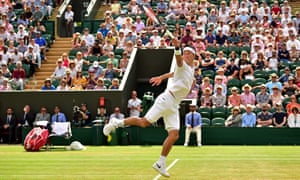 Japan’s Kei Nishikori watches the ball after jumping to play a shot