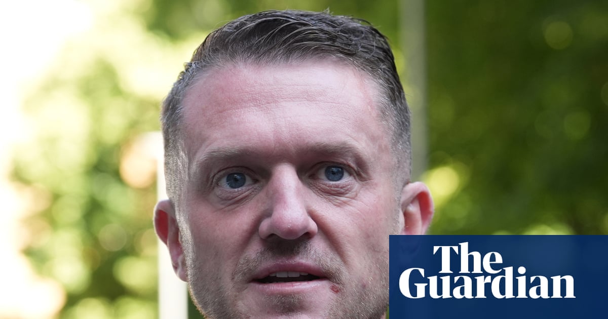 Tommy Robinson cleared of terror-related offence over phone code refusal