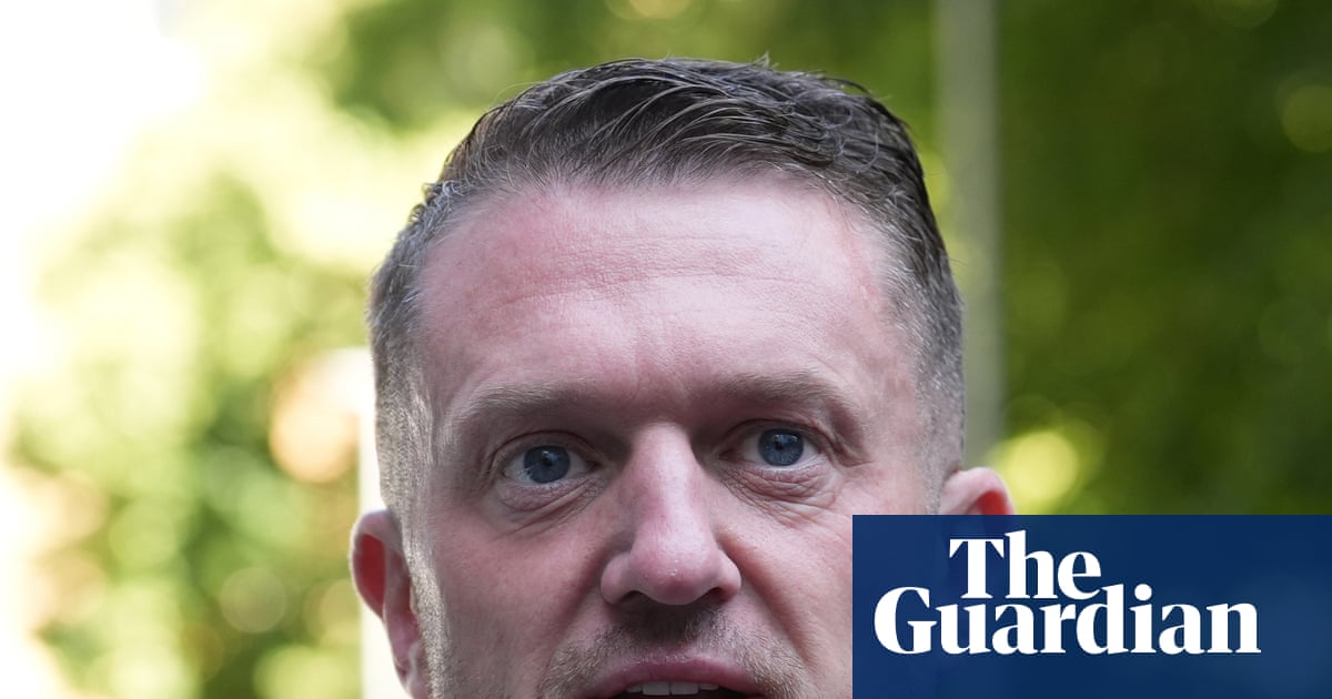 Tommy Robinson cleared of terror-related offence over phone code refusal