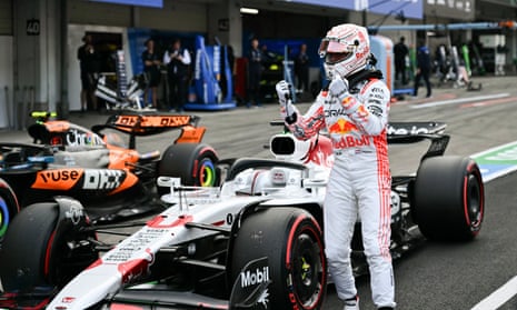Max Verstappen celebrates after taking pole position ahead of McLaren’s Lando Norris at the Japanese Grand Prix.
