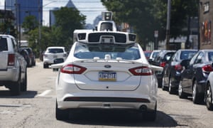 A self-driving Ford Fusion hybrid car is test driven, Thursday, Aug. 18, 2016, in Pittsburgh.