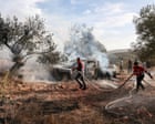 Israeli settlers attack olive farmers and Washington Post journalist in West Bank