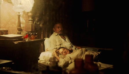 Two people in a bedroom in a still from Death Has No Master.