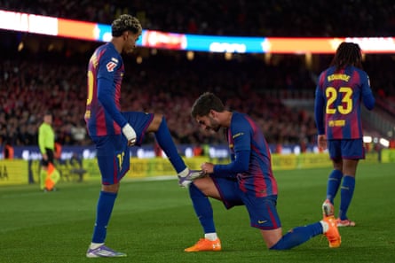 Ferran Torres celebrates scoring Barcelona’s fourth goal on their return to the Spotify Camp Nou by shining Lamine Yamal’s boot.
