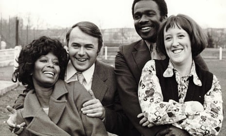 Jack Smethurst, second from left, with, from left, Nina Baden-Semper, Rudolph Walker and Kate Williams in the 1973 film version of Love Thy Neighbour.