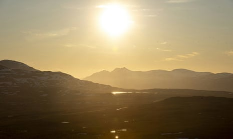 The midnight sun shines at the border area between Finland and Norway in Kilpisjarvi, Enontekio, Finland, on June 22, 2020. Finland’s national meteorological institute has registered its hottest temperature for June since records began in 1844.